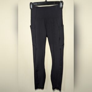 Fabletics Oasis PureLuxe High-Waisted Capri with Pockets Black Women's Size XS*